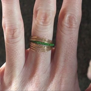 Gold and green Go ring